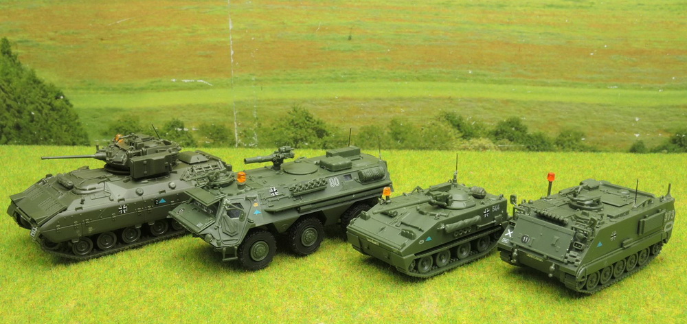 Roco H0 Panzer und TPz Konvolut M2 Bradley M114 etc 4teilig 1200.jpg